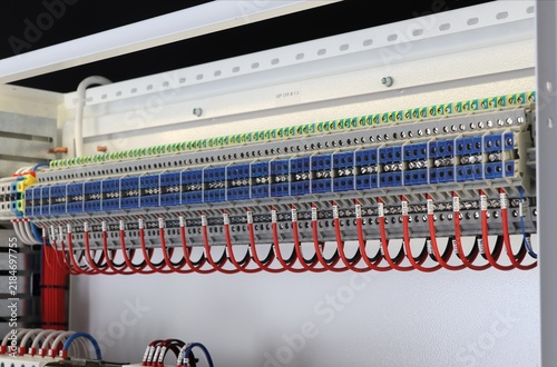 Electrical screw terminals for connecting copper electrical wires with metal lugs in electrical switchboard. 