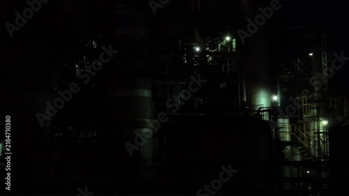 Vertical Industrial Plant Structure with Work Lights and Piping at Night in Chidoricho Kawasaki