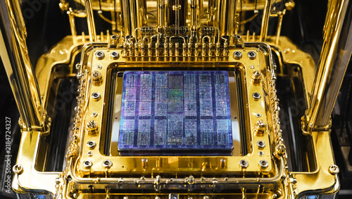 Obraz na płótnie Macro view of a gold quantum processor chip inside a high-tech cryogenic computing system.