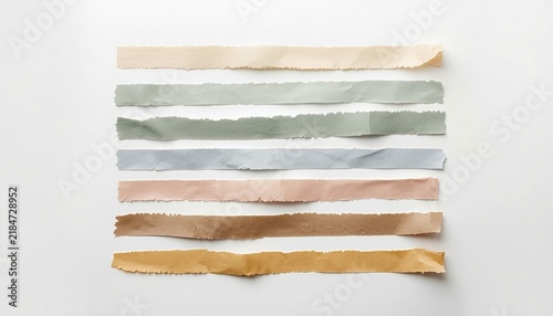 Collection of colorful torn paper tape strips isolated on white