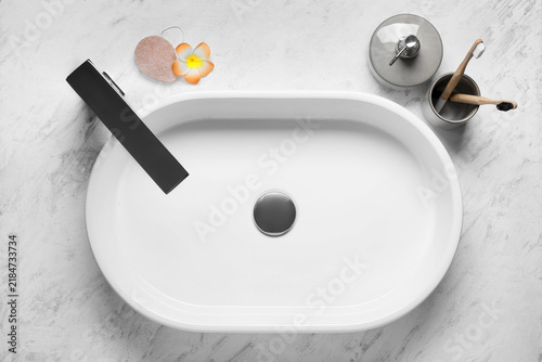 Foto Self care and wellness routine, bathroom sink with bamboo toothbrushes and spa a