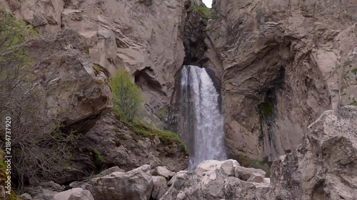 Majestic Waterfall Cascading Through Ancient Evergreen Forest in British Columbia, Canada