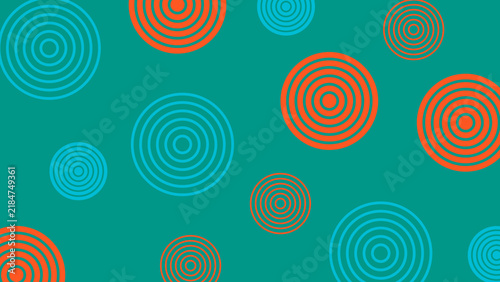 Dynamic colorful concentric circles pattern design featuring vibrant orange and turquoise targets scattered across a rich teal background for modern abstract art concepts