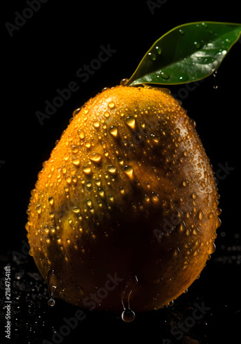 Pear with Water Droplets on Black Background