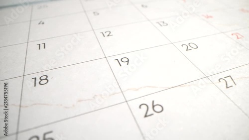 2027 calendar switching panels with black digits. Macro view date