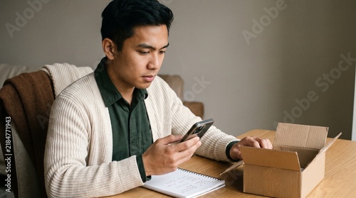 Man Checking Product Reviews Before Online Purchase