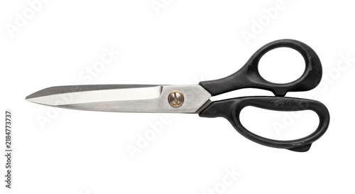 Fotografie Sharp metal scissors with black ergonomic handles on a white background