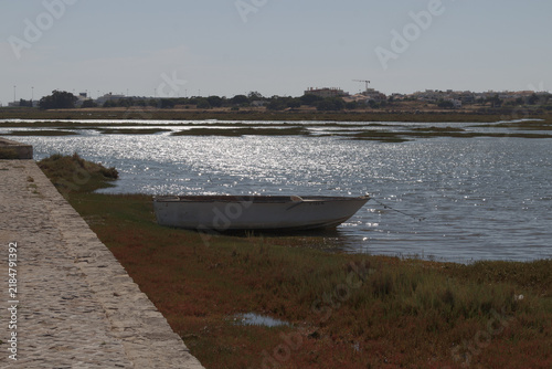 Fotografie Serene moments at Ria Formosa in Faro, Portugal