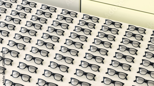 Rows of black glasses on a table
