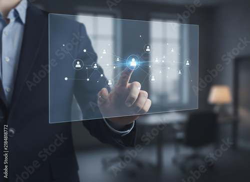 Businessman touching virtual glass interface. Digital communication network. Technology hand on screen. Social connection management
