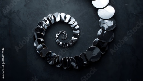 Dark Metallic Spiral Necklace Coiled on Dark Surface