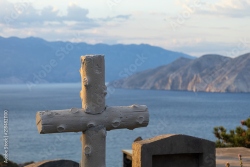 cemetery cross overlooking the sea