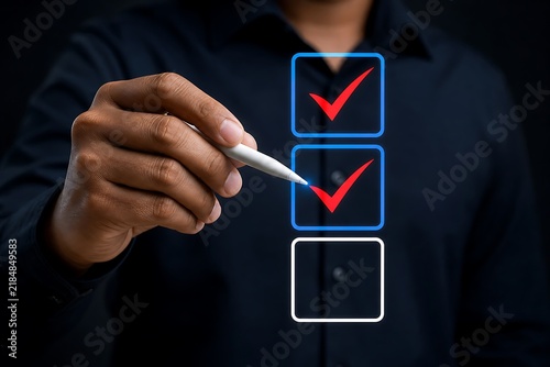 Hand marking checkmarks on digital interface with progress indicators and error symbol