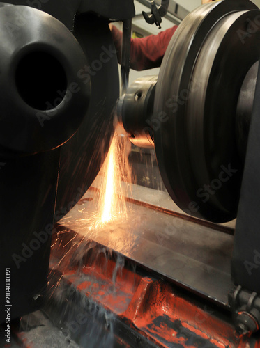 Grinding of the crankshaft on a grinding machine.