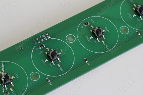 Fotografía Macro shot of a green printed circuit board PCB with surface mount push buttons