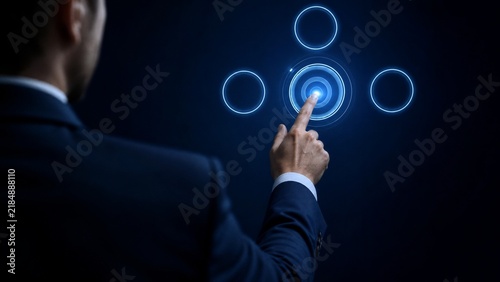 Businessman touching digital holographic interface for business strategy and data analysis