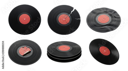 Collection of vinyl records in various states on white background