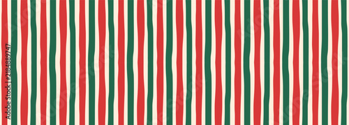 Christmas seamless pattern. Stripe cane texture with red, green and beige lines. Vector illustration