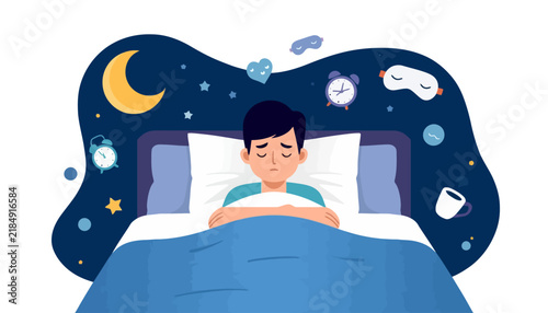 Sleeping man resting comfortably in his bed under a blue blanket at night.