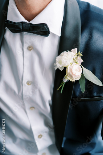 Obraz na płótnie Close up of formal suit with boutonniere