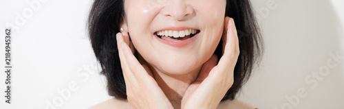 Принти на полотні Beauty portraits of women in their 50s with beautiful skin, laughing heartily; s