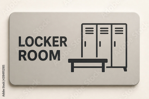 A rectangular sign with the text LOCKER ROOM and an icon of lockers and a bench on a light-colored background.