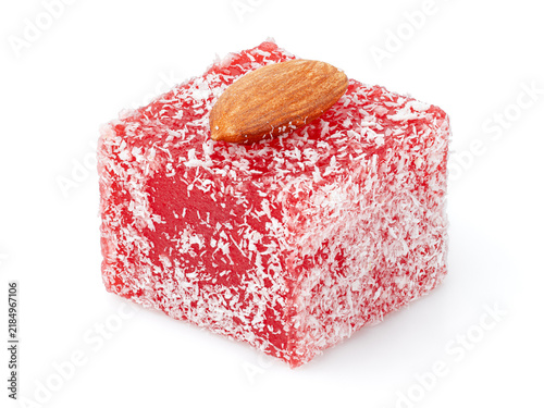 Assorted Turkish delight sweets pattern background. Colorful Rahat lokum with nuts and coconut flakes close up. Dessert	
