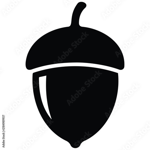 Acorn nut silhouette vector icon isolated on white background for autumn season design.