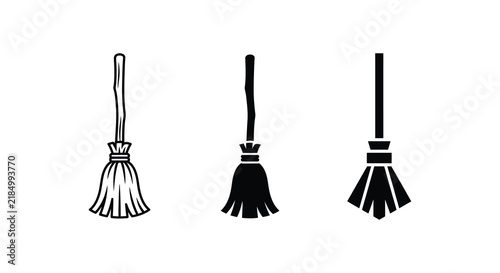 Картината върху платно Three broom silhouettes against a white background depict cleaning tools