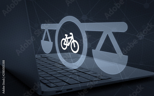 Digital concept with a laptop and a glowing balance scale icon featuring a bicycle in the center, representing traffic law, cycling rights, and legal advice.