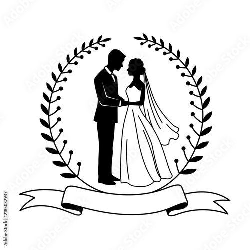 Silhouette of bride and groom embraced inside laurel wreath with decorative ribbon