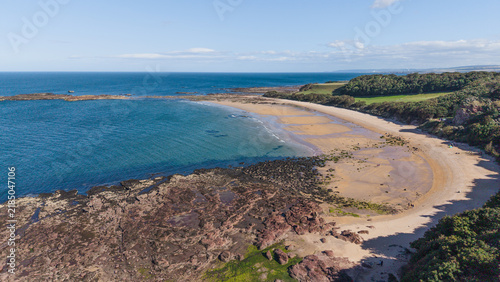 Canvas Print Scenic sandy bay of Seacliff Beach with rocky coast in North Berwick Scotland