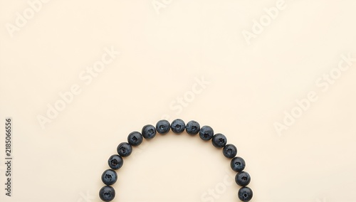 Blueberry Bracelet Semi Circle on Pale Beige Background