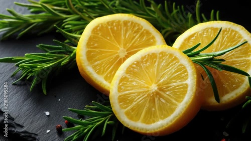 Organic Oranges and Rosemary on Table