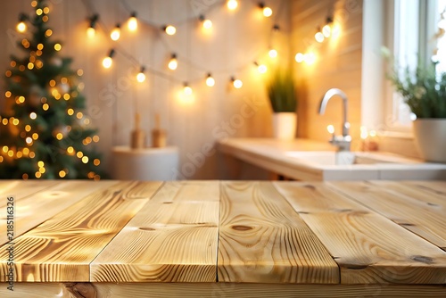 Wooden Table Surface with Blurred Christmas Kitchen Background and String Lights