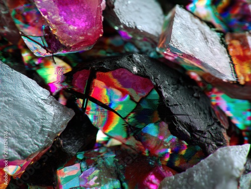 Macro view of iridescent mineral crystals and geological specimens