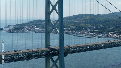 Aerial drone footage of Akashi Kaikyo Bridge over the strait, Awaji, Hyogo, Japan
