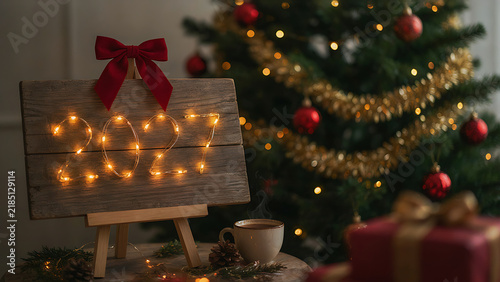 Wooden easel sign with 2027 fairy lights, red bow, hot cocoa cup and christmas tree, created with generative ai.