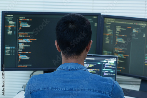 Programmer Developing Software with Code and Digital Technology