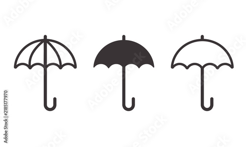 Set of three minimal umbrella icons in outline and solid styles for weather web design UI.