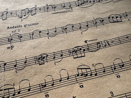Obraz na plátně Close up of old sheet music with musical notes
