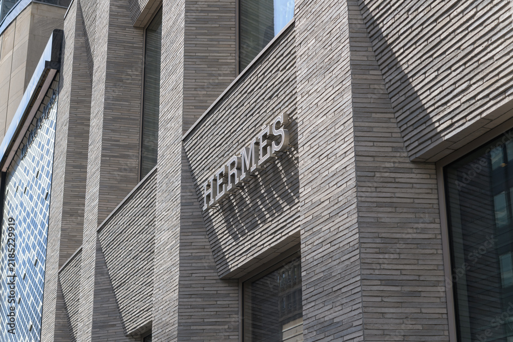 Fototapeta premium exterior building facade and sign of Hermès, a fashion accessories store, located at 100 Bloor St W (inside 10 Bellair Condominium), Toronto
