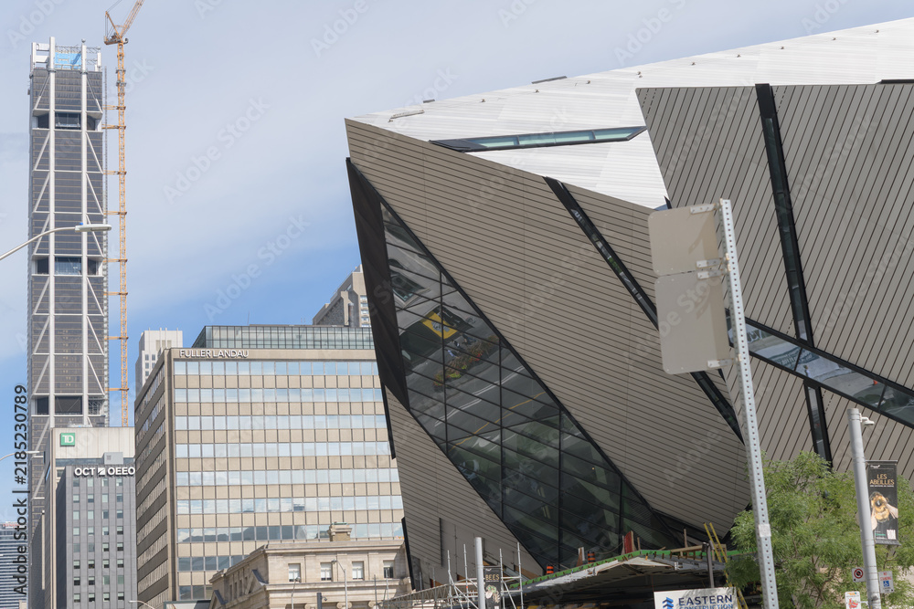Fototapeta premium looking east on Bloor St W with view of Royal Ontario Museum, office/commercial buildings and One Bloor West, Toronto