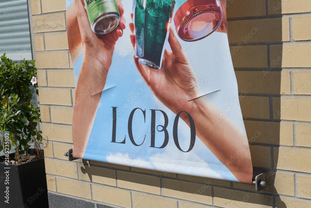 Fototapeta premium LCBO promotional banner outside a liquor shop in Toronto