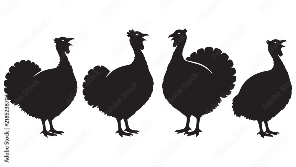 Obraz premium Four Black Silhouette Turkeys Standing in a Row