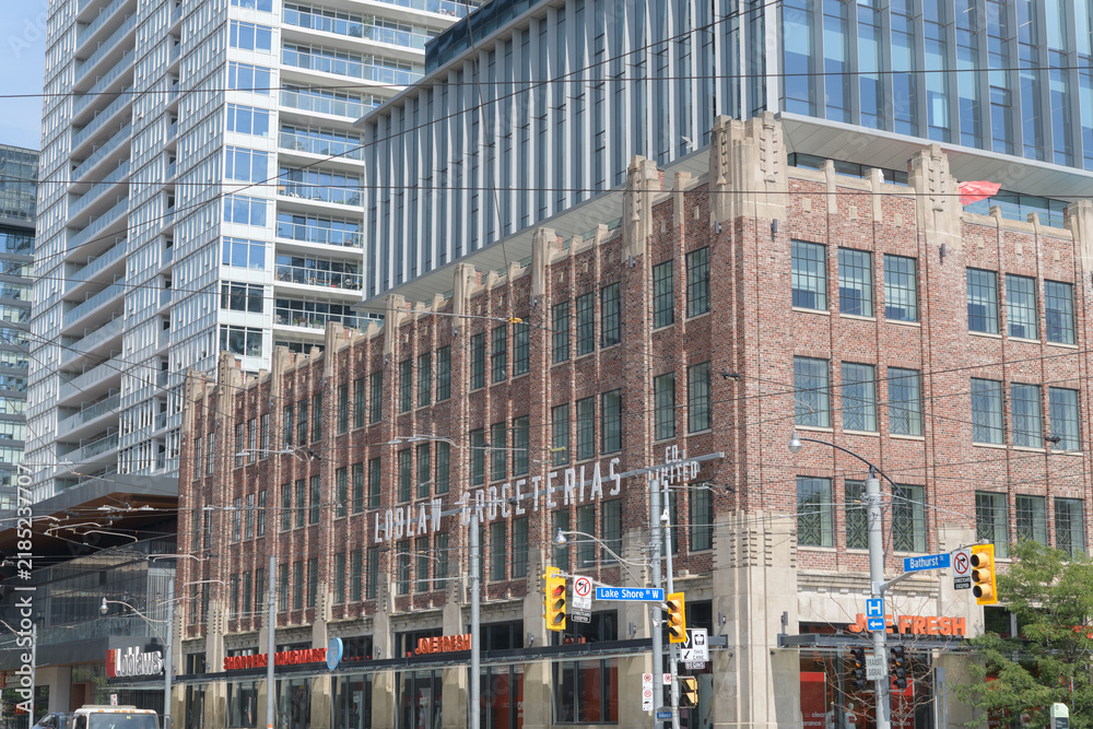 Obraz premium wide view of Loblaw Grocerteria headquarters and warehouse now the West Block development located at 500 Lake Shore Blvd W, northeast corner of Bathurst St, Toronto