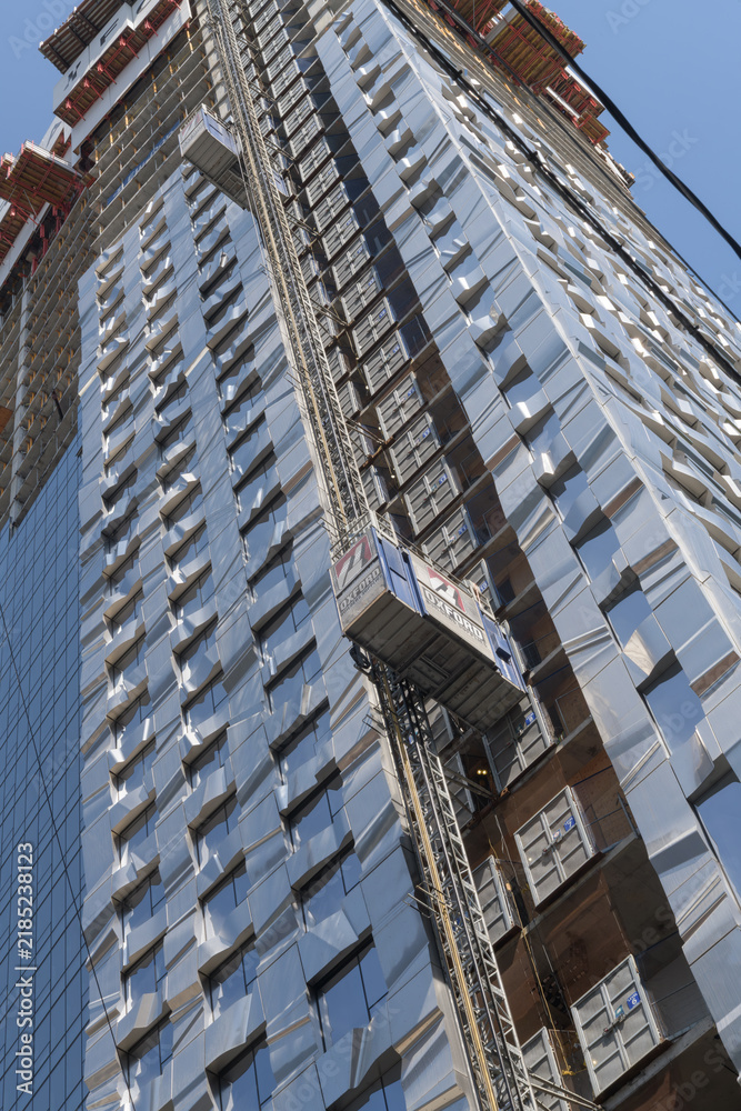 Obraz premium skyward view of Forma Toronto, a condominium complex designed by Frank Gehry, under construction at 266 King St W & Ed Mirvish Way / Duncan St