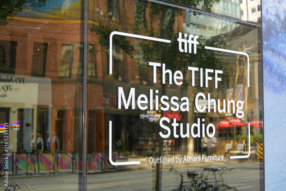 Obraz premium vinyl window sign of The TIFF Melissa Chung Studio, exterior of TIFF Lightbox, a movie theatre, located at 350 King St W, Floor 1 of the Festival Tower, Toronto