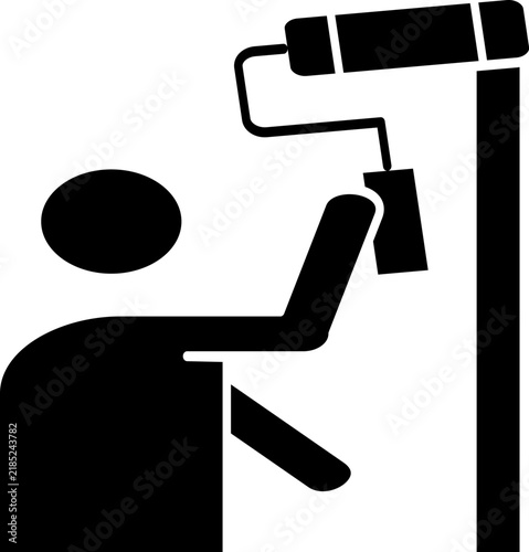 Tradesman holding a paint roller tool coating or painting a wall surface
