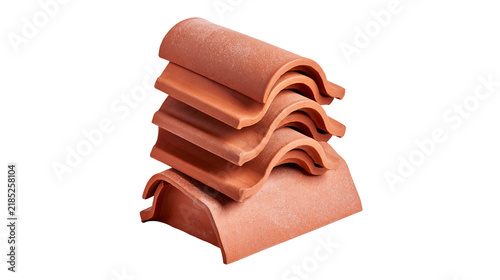 Obraz na płótnie Isolated stack of traditional reddish-brown terracotta clay roof tiles for construction projects
